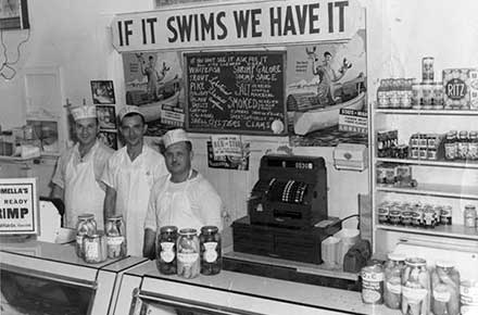 Friendly staff at Euclid Fish Company counter