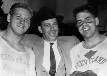 Modzelewski, Brown, and Graham after win at Pittsburgh, 1955